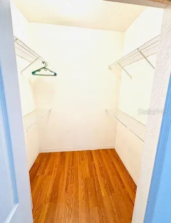 a living room with lots of furniture and gym equipment