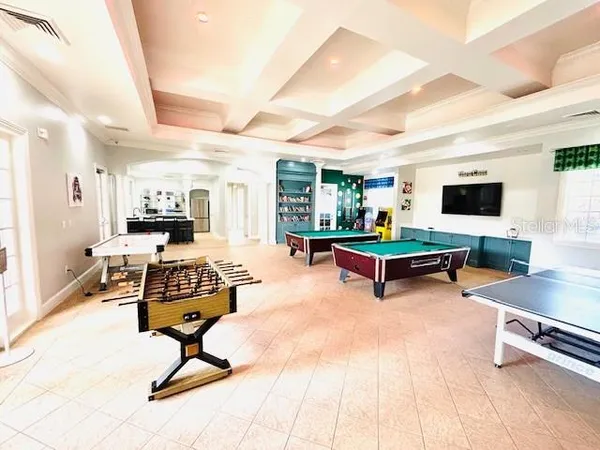 a building outdoor space with patio furniture and potted plants