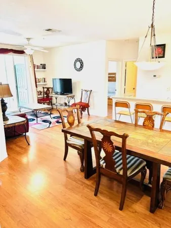 a view of a dining room with furniture
