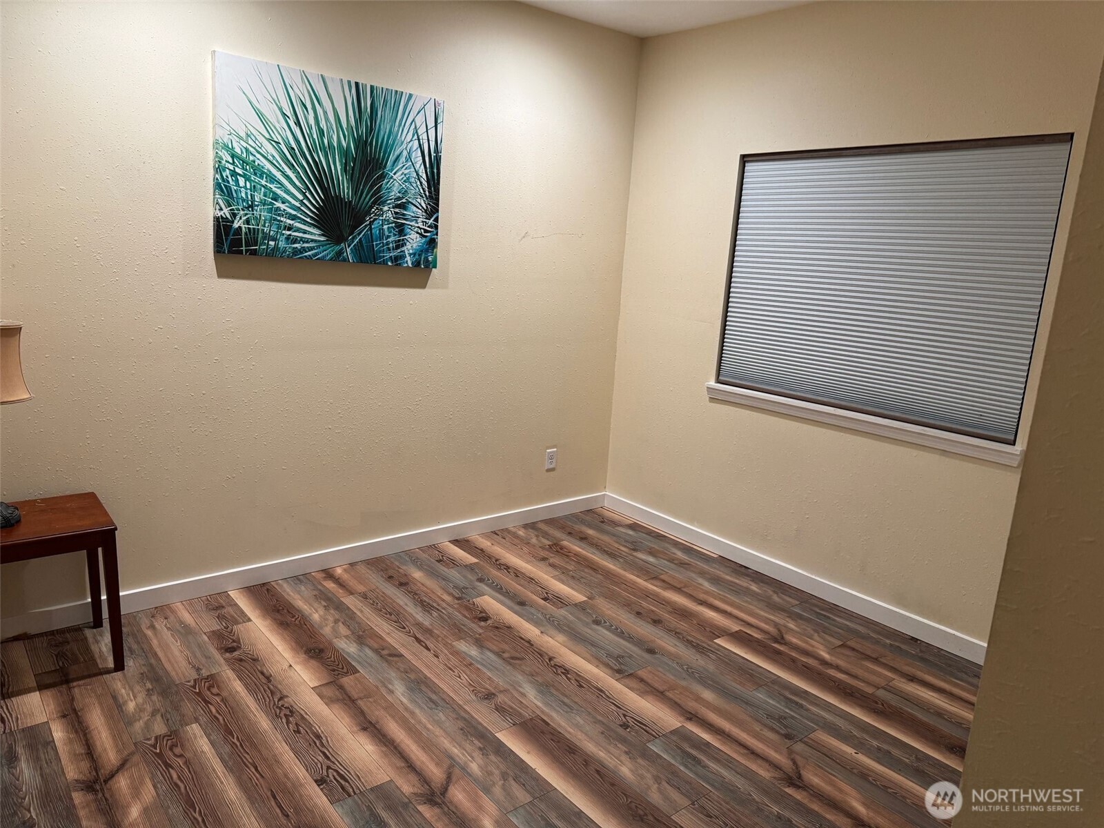 918 Orchard Avenue Gold Bar, WA 98251 - Photo 6 of 9 a view of a hallway with wooden floor