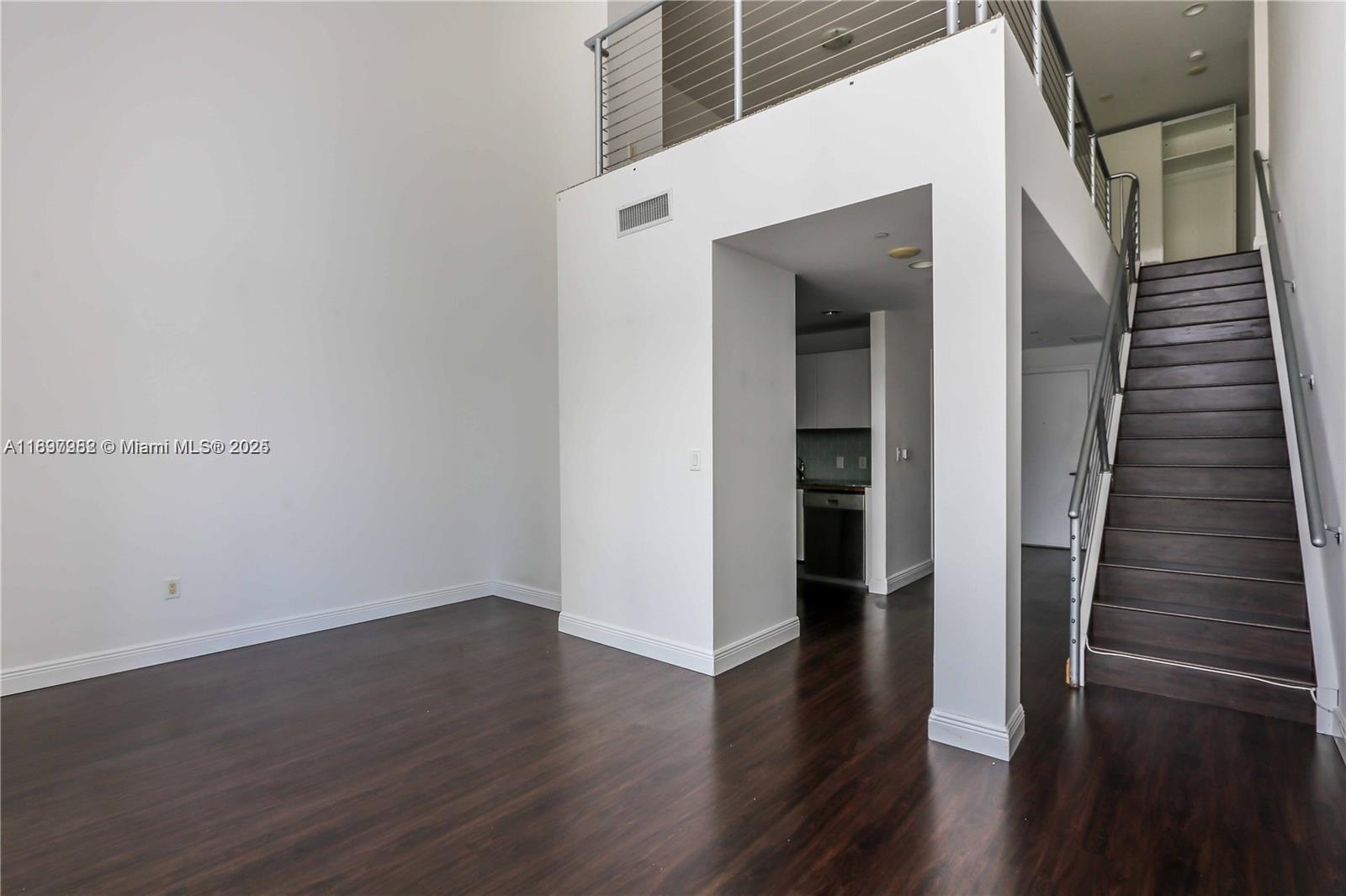 1050 Brickell Avenue, Unit 414 Miami, FL 33131 - Photo 12 of 42 wooden floor in an empty room
