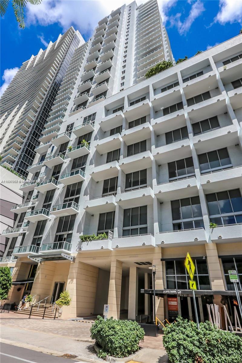 1050 Brickell Avenue, Unit 414 Miami, FL 33131 - Photo 28 of 42 a front view of a building
