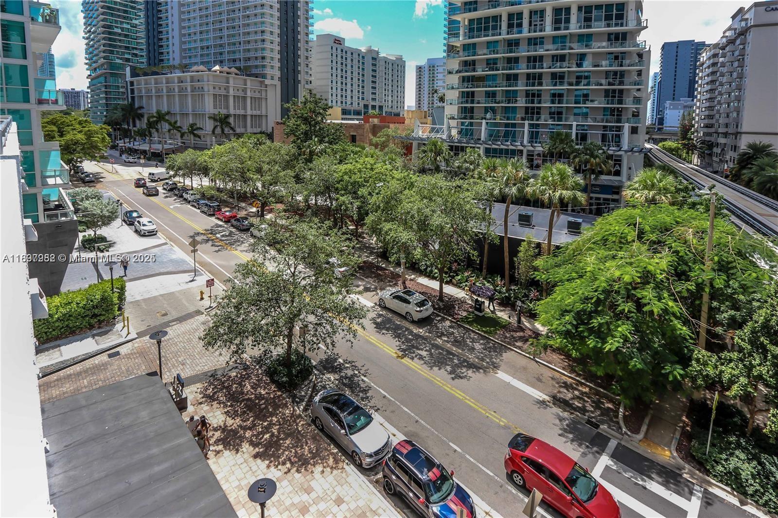 1050 Brickell Avenue, Unit 414 Miami, FL 33131 - Photo 31 of 42 a view of a city with tall buildings