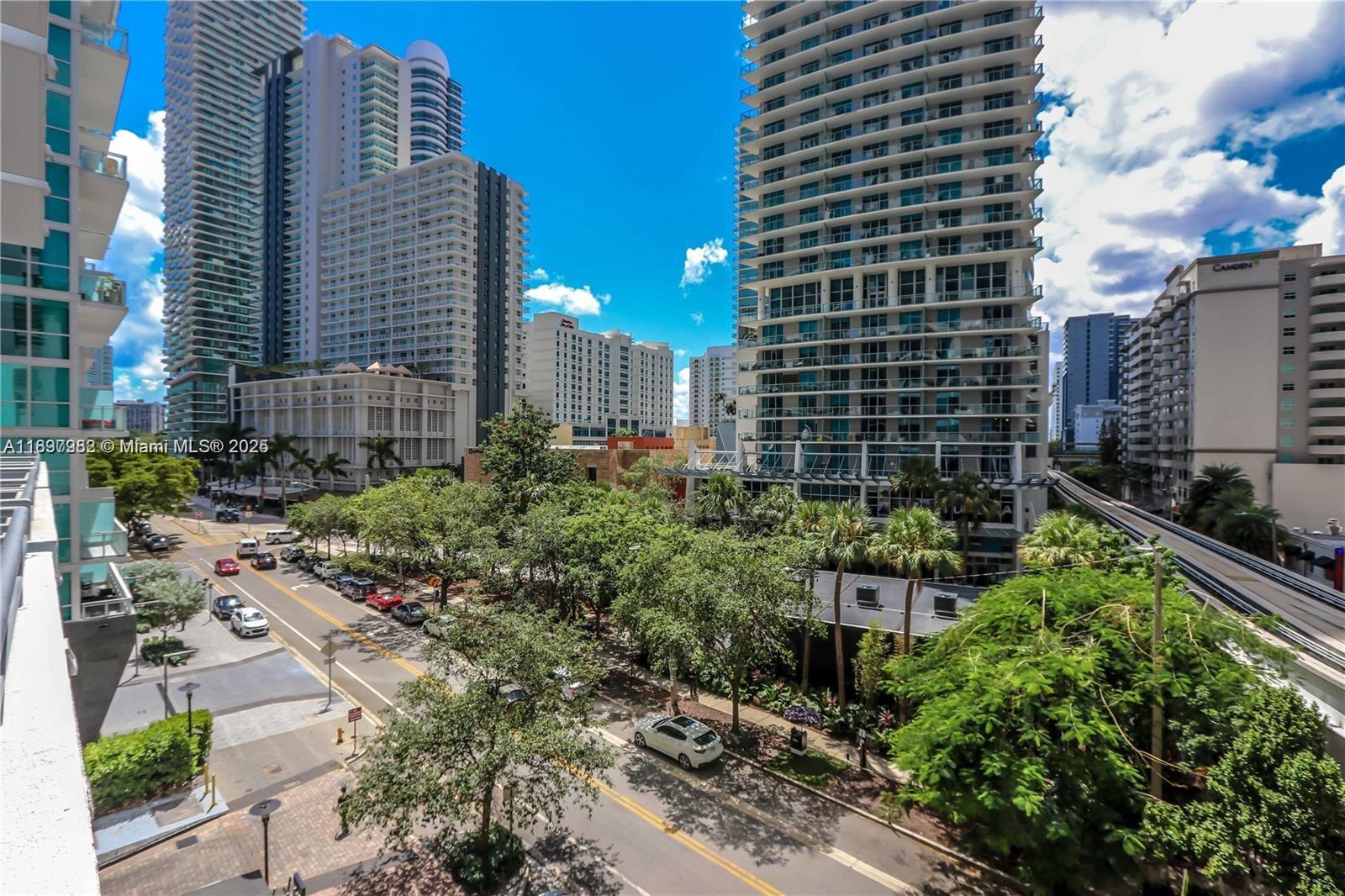 1050 Brickell Avenue, Unit 414 Miami, FL 33131 - Photo 33 of 42 a view of a city with tall buildings