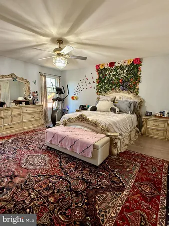 a bed room with a bed and a couch