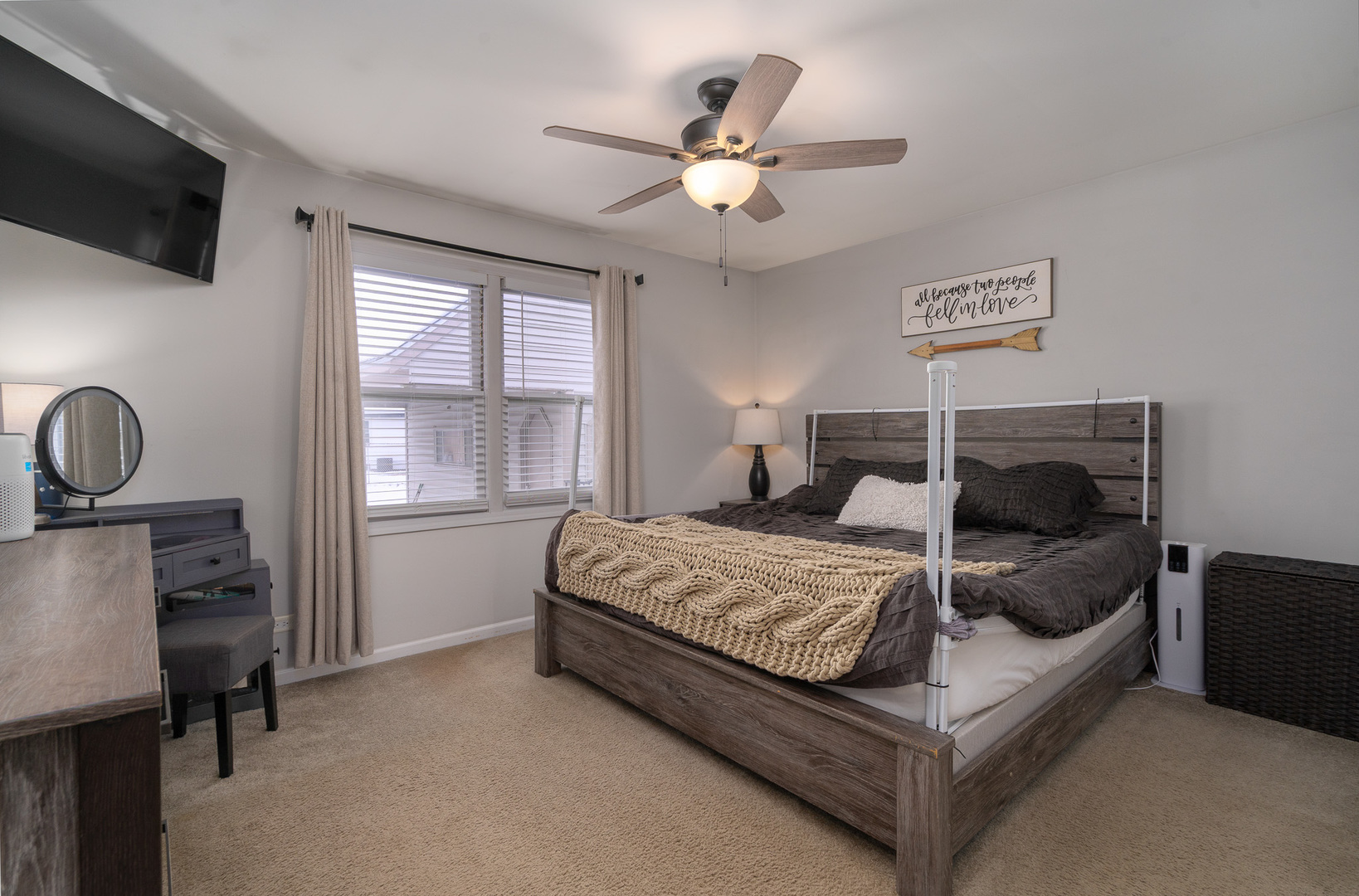 224 Kedvale Court Bolingbrook, IL 60440 - Photo 11 of 40 a bedroom with a bed a flat screen tv and couches