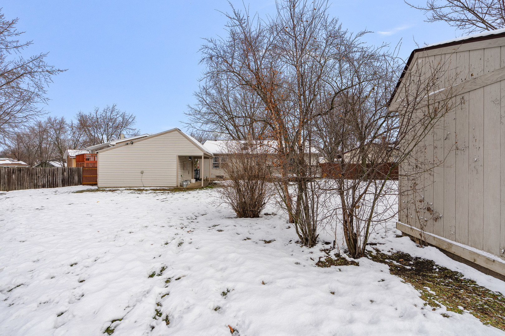 224 Kedvale Court Bolingbrook, IL 60440 - Photo 24 of 40 a view of a yard covered with snow in front of house