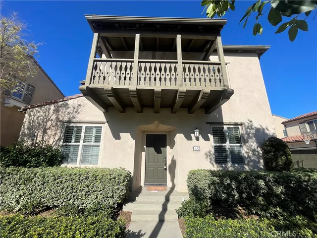 front view of a house with a small yard