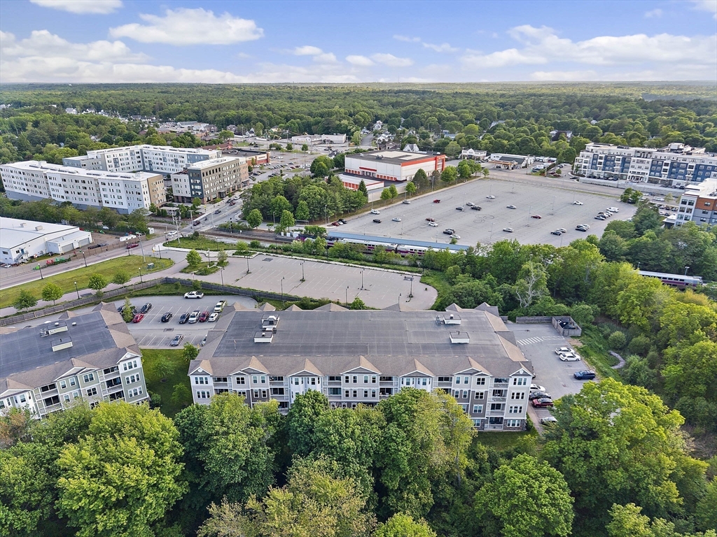 70 Trotter Road, Unit 310 Weymouth, MA 02190 - Photo 12 of 14 an aerial view of residential houses with outdoor space