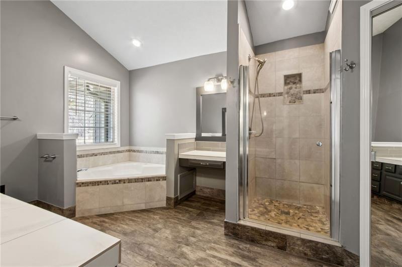 6604 Windbrook Way Flowery Branch, GA 30542 - Photo 33 of 64 a bathroom with a shower and a sink