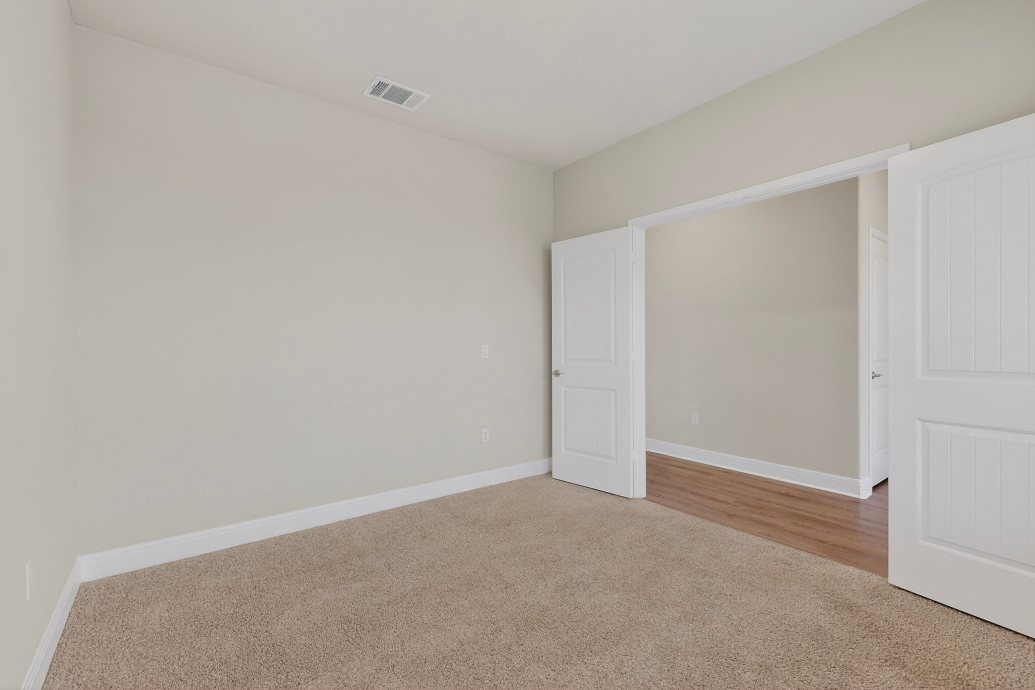 16809 Guido Cove Pflugerville, TX 78660 - Photo 33 of 40 Neutral-toned walls and plush carpeting complement the crisp white trim