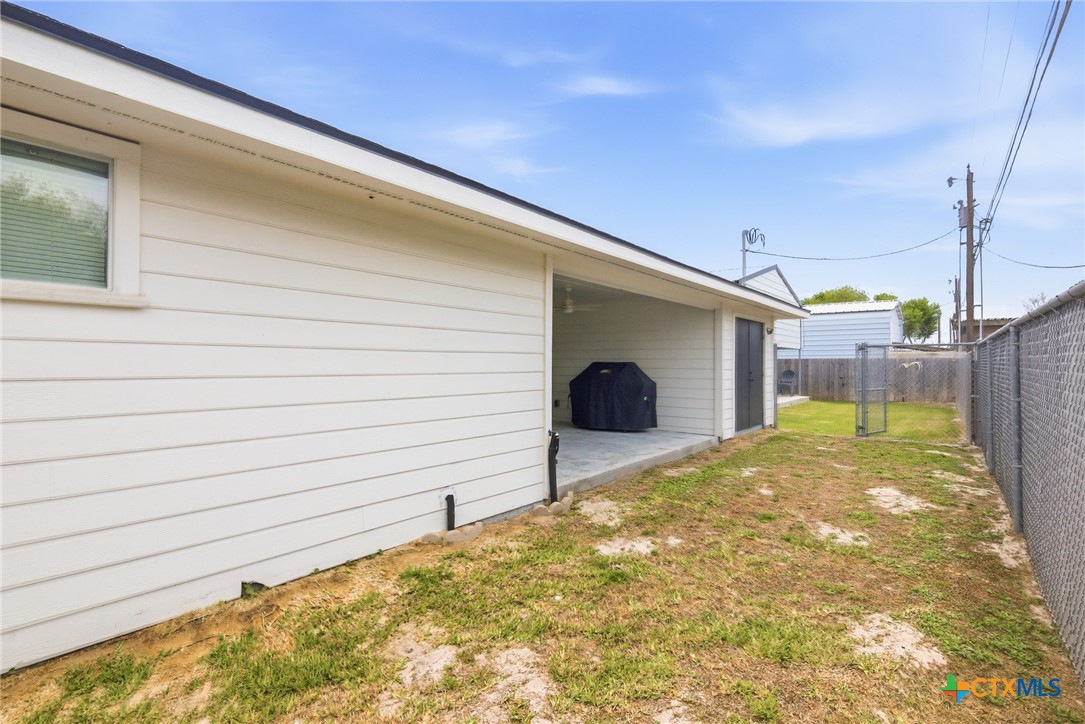77 Carrie Street Port O'Connor, TX 77982 - Photo 29 of 32 a view of backyard of house