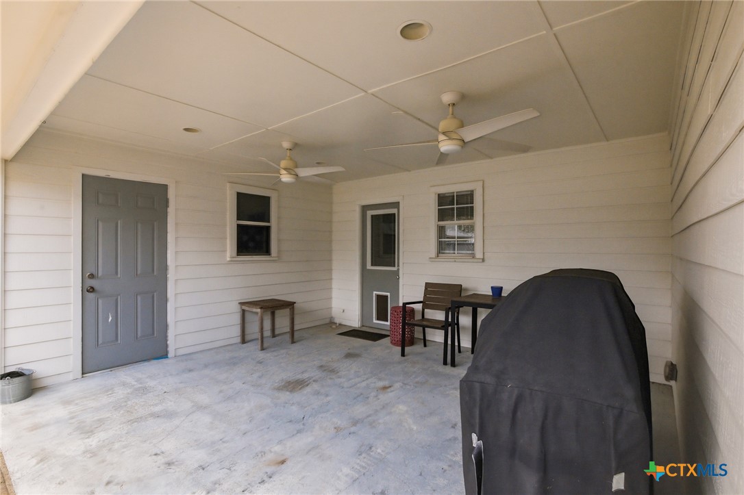 77 Carrie Street Port O'Connor, TX 77982 - Photo 30 of 32 a workspace with furniture and window