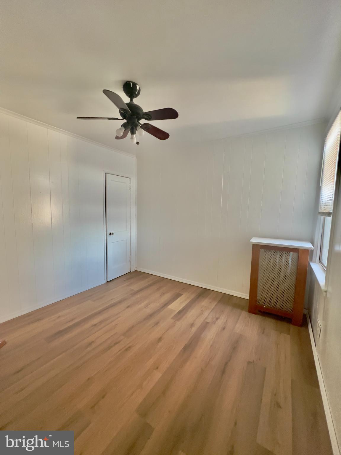 124 West Spencer Street Philadelphia, PA 19120 - Photo 17 of 34 a view of empty room with wooden floor