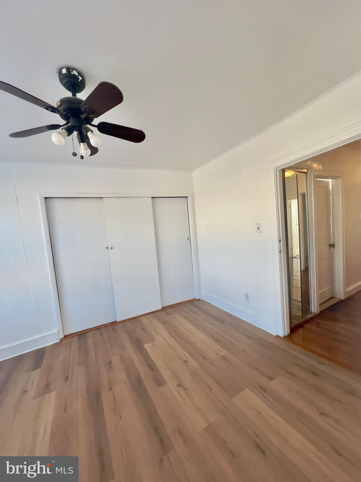124 West Spencer Street Philadelphia, PA 19120 - Photo 19 of 34 a view of room with hardwood floor and ceiling fan