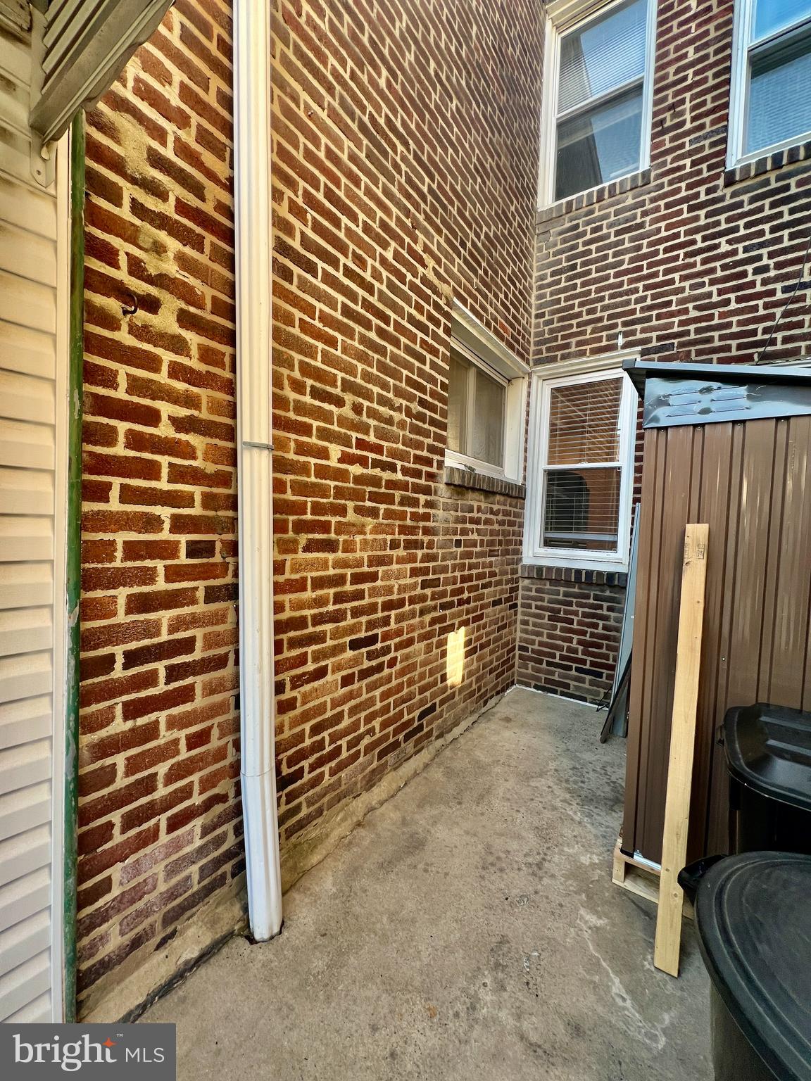 124 West Spencer Street Philadelphia, PA 19120 - Photo 33 of 34 a view of a door and brick wall