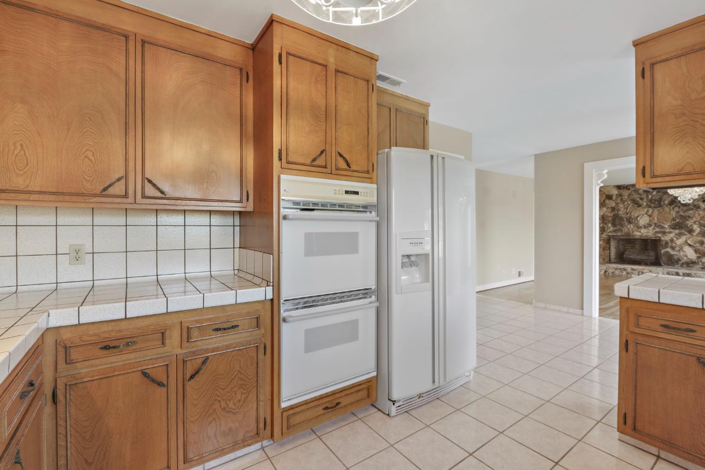 750 Clearfield Drive Millbrae, CA 94030 - Photo 13 of 35 a kitchen with appliances cabinets and furniture