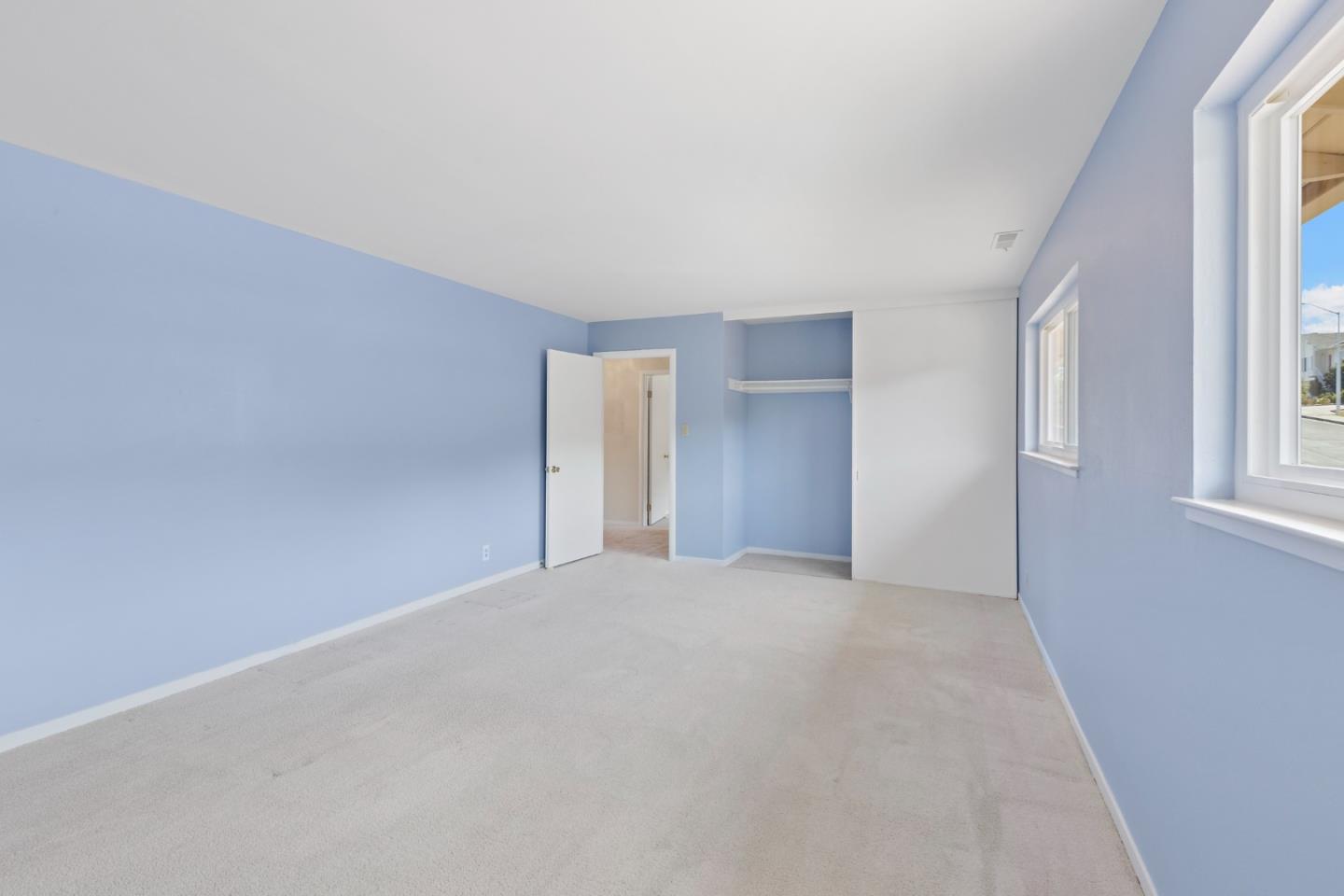 750 Clearfield Drive Millbrae, CA 94030 - Photo 24 of 35 an empty room with windows