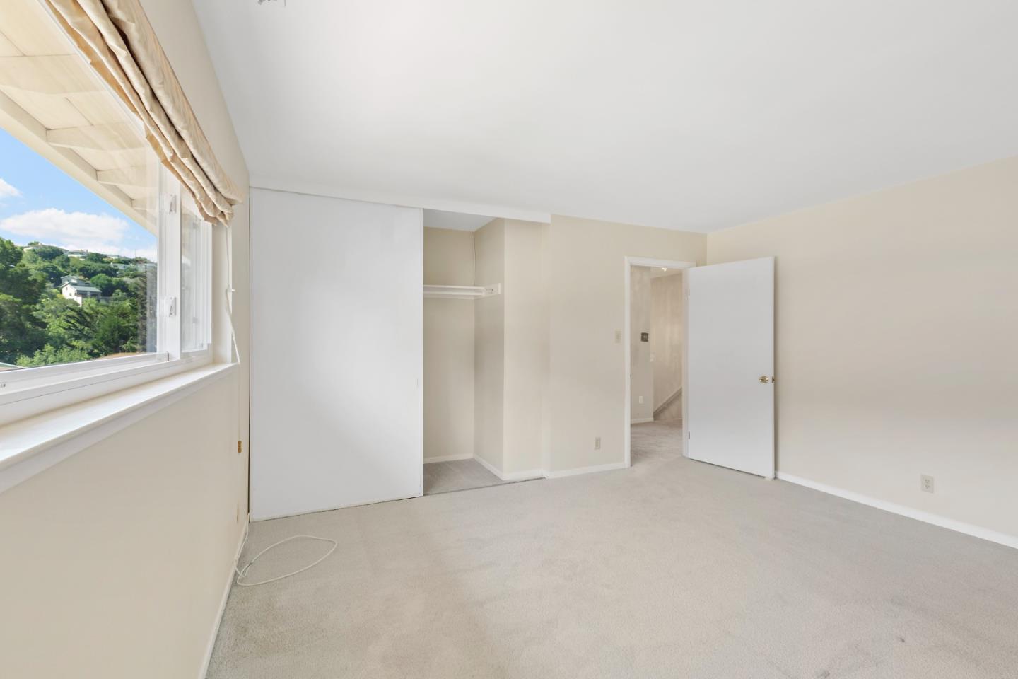 750 Clearfield Drive Millbrae, CA 94030 - Photo 26 of 35 a view of an empty room with a window