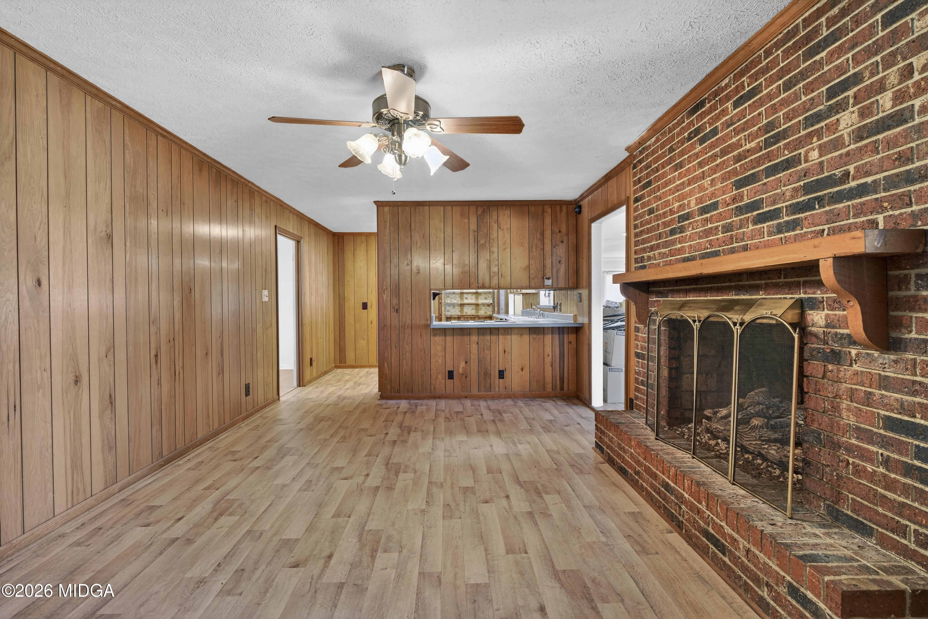 1775 Lower Hartley Bridge Road Byron, GA 31008 - Photo 17 of 51 a view of a livingroom with a chandelier