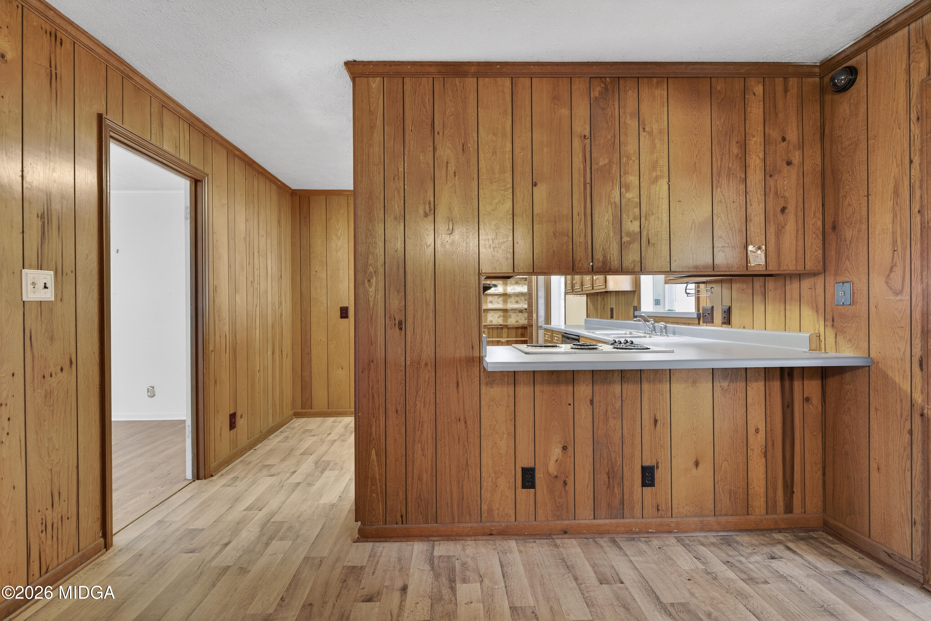 1775 Lower Hartley Bridge Road Byron, GA 31008 - Photo 18 of 51 a kitchen with granite countertop wooden cabinets and stainless steel appliances