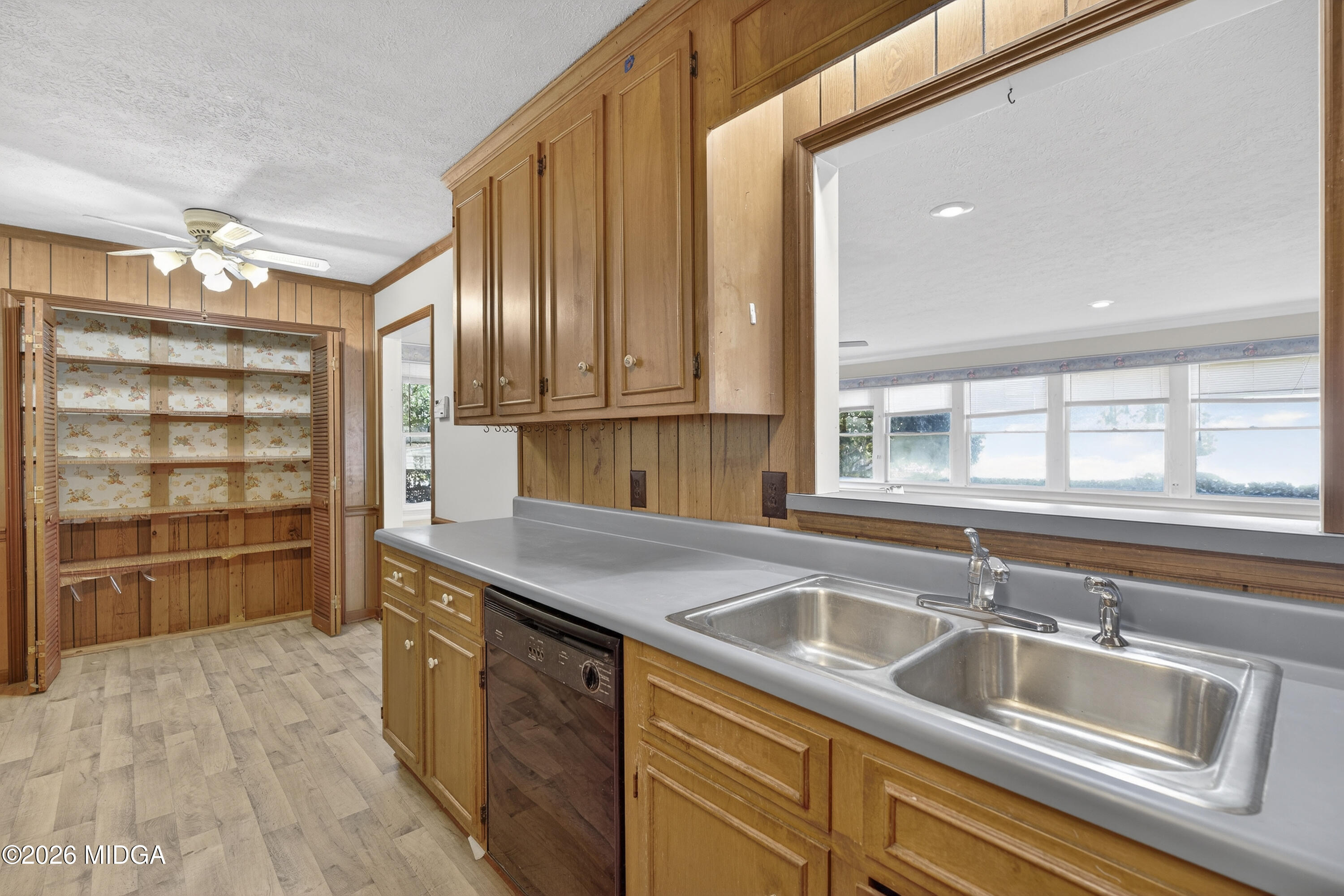 1775 Lower Hartley Bridge Road Byron, GA 31008 - Photo 25 of 51 a kitchen with granite countertop a sink and a refrigerator