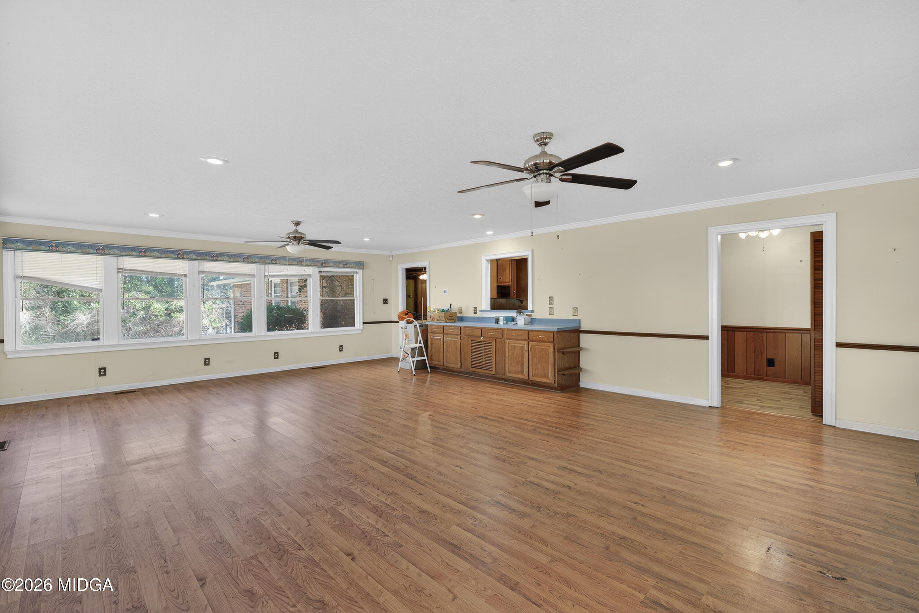 1775 Lower Hartley Bridge Road Byron, GA 31008 - Photo 28 of 51 a view of a kitchen with microwave and wooden floor