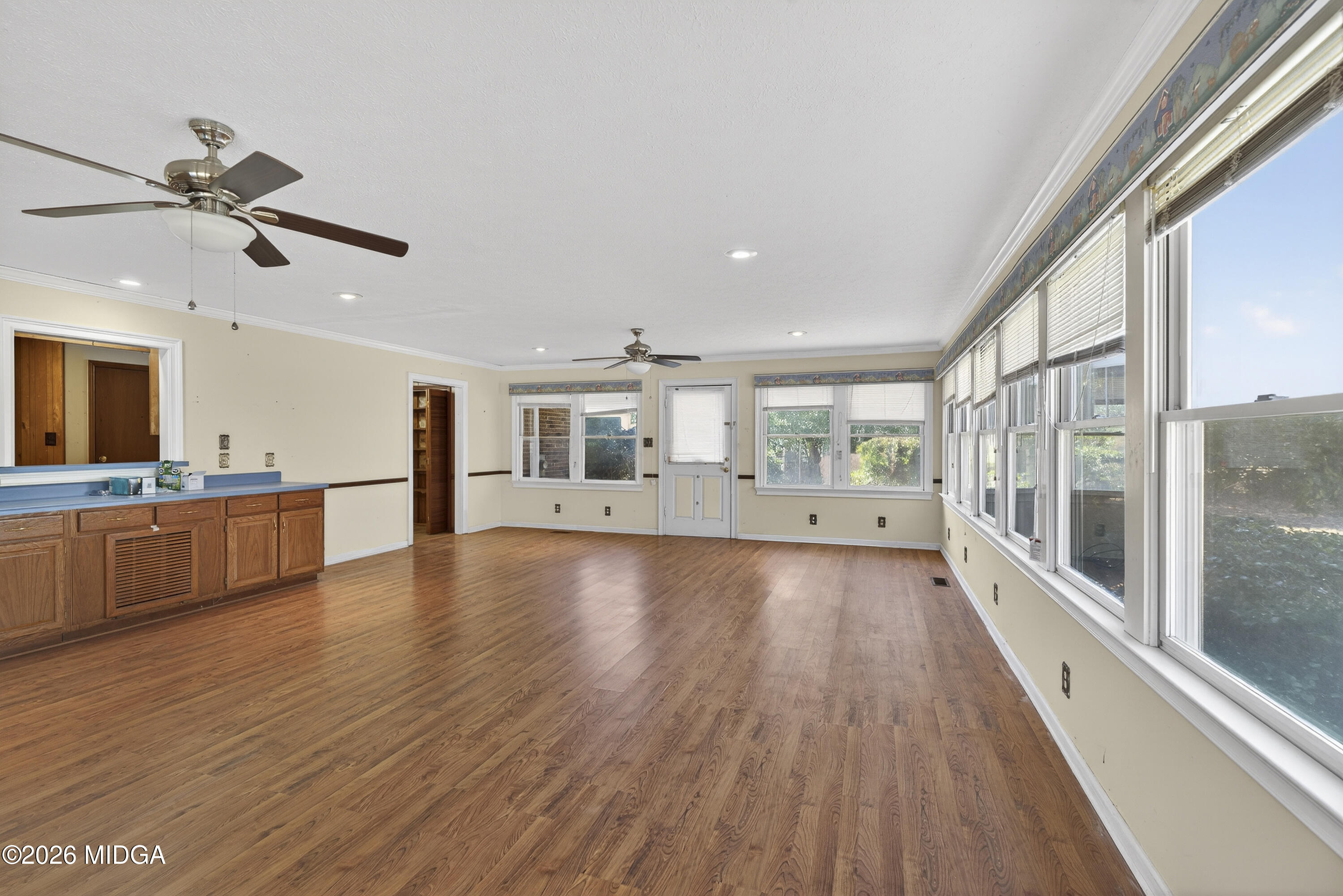 1775 Lower Hartley Bridge Road Byron, GA 31008 - Photo 29 of 51 a view of a kitchen with a sink and wooden floor