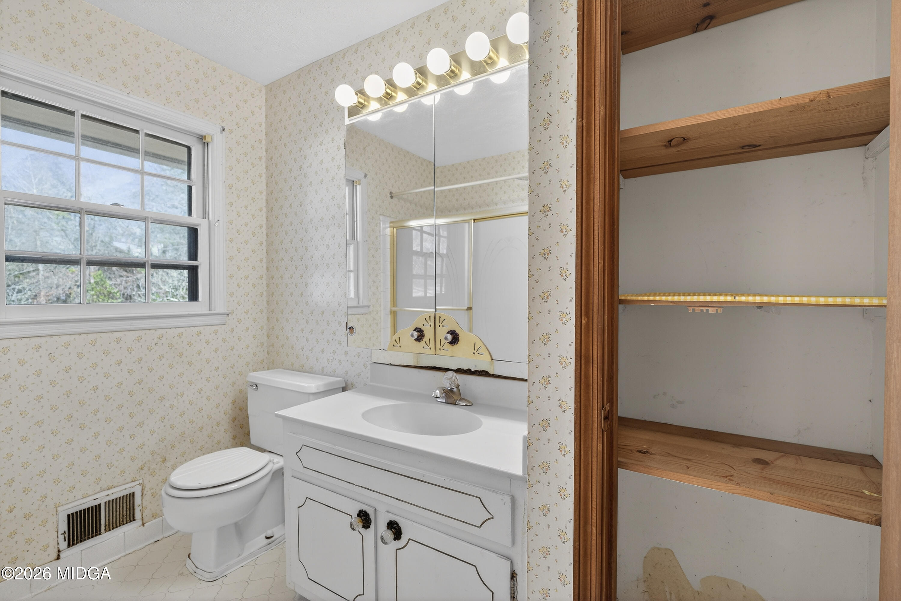 1775 Lower Hartley Bridge Road Byron, GA 31008 - Photo 31 of 51 a bathroom with a sink a toilet and shower