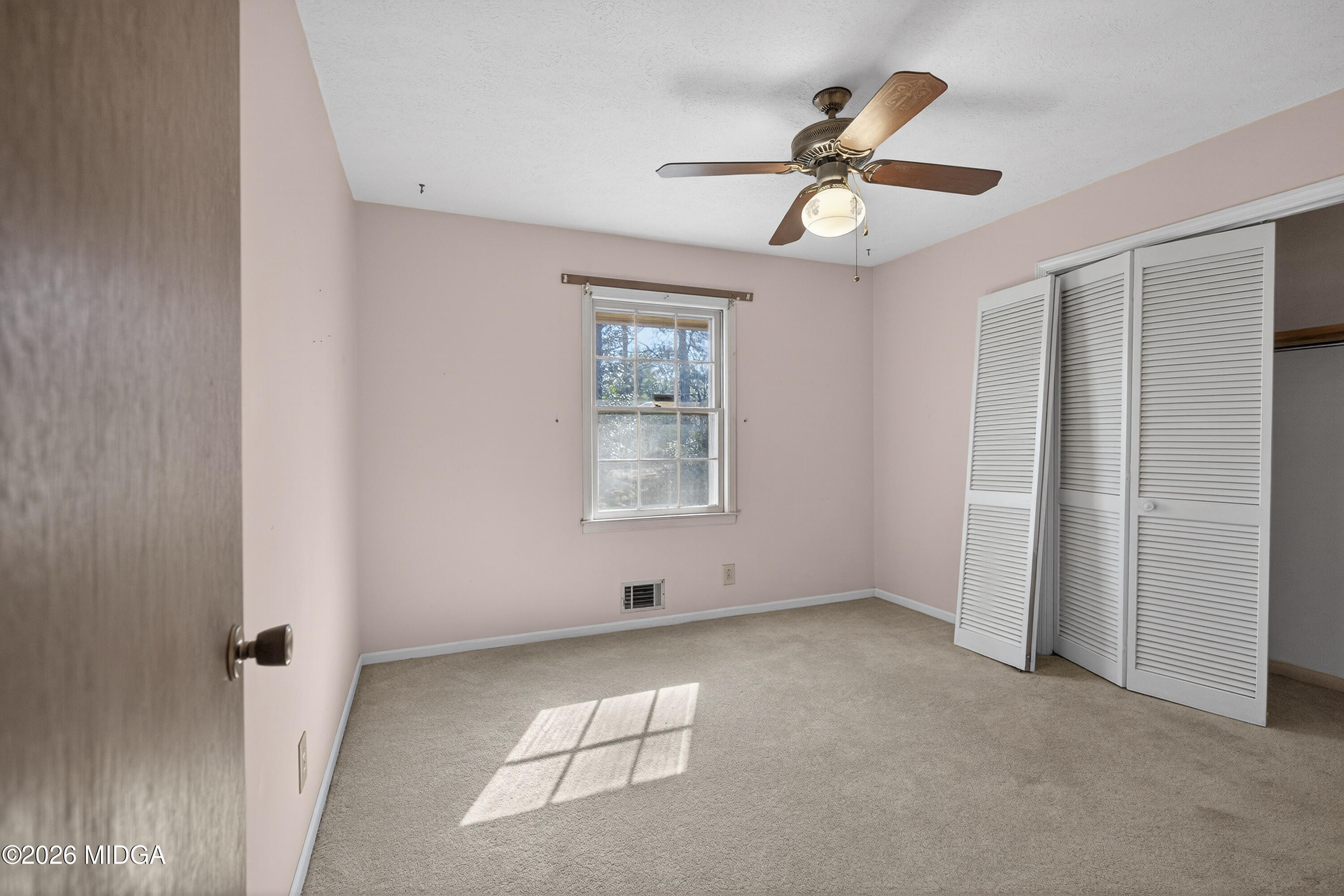 1775 Lower Hartley Bridge Road Byron, GA 31008 - Photo 35 of 51 a view of an empty room with a window