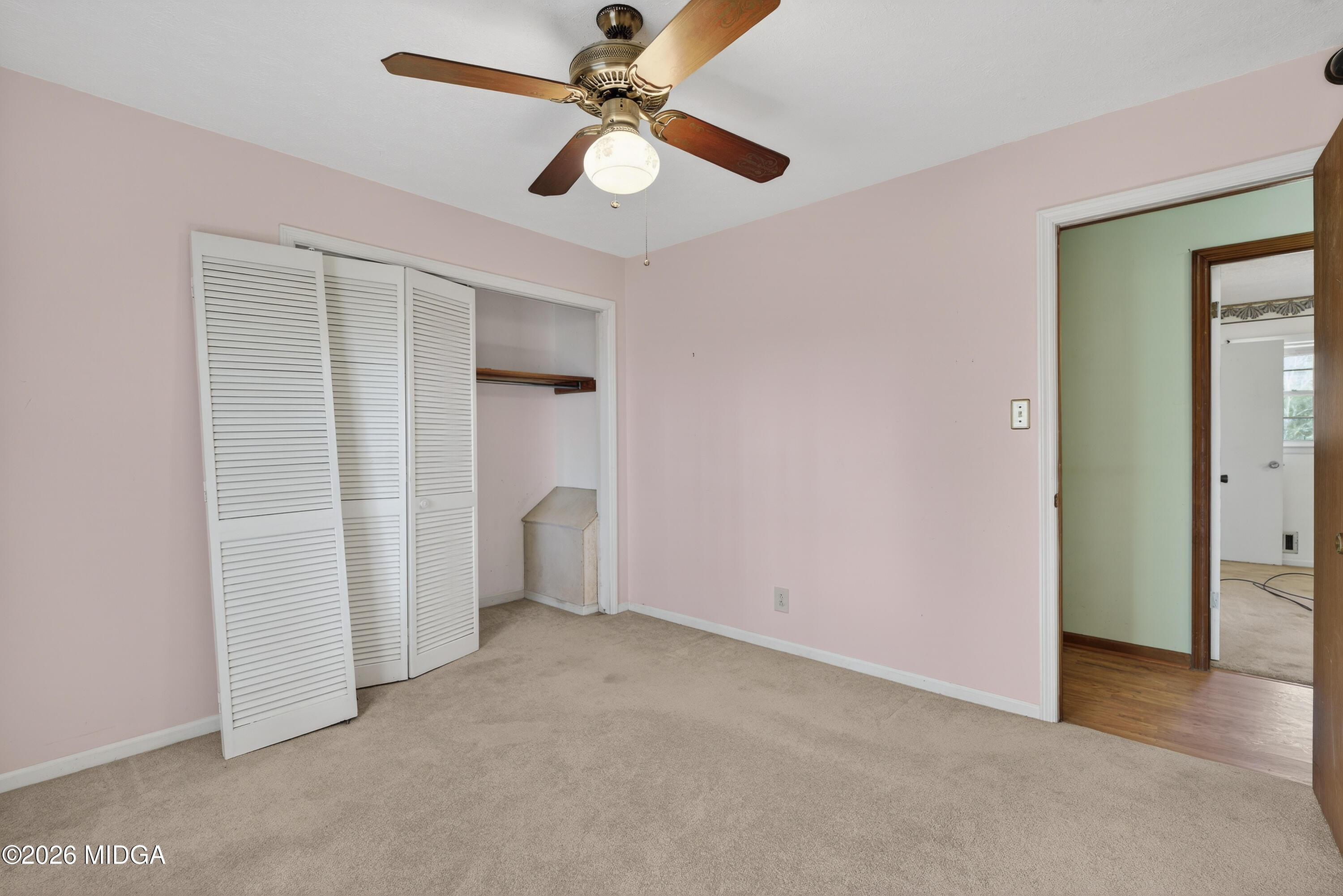1775 Lower Hartley Bridge Road Byron, GA 31008 - Photo 36 of 51 an empty room with closet and windows