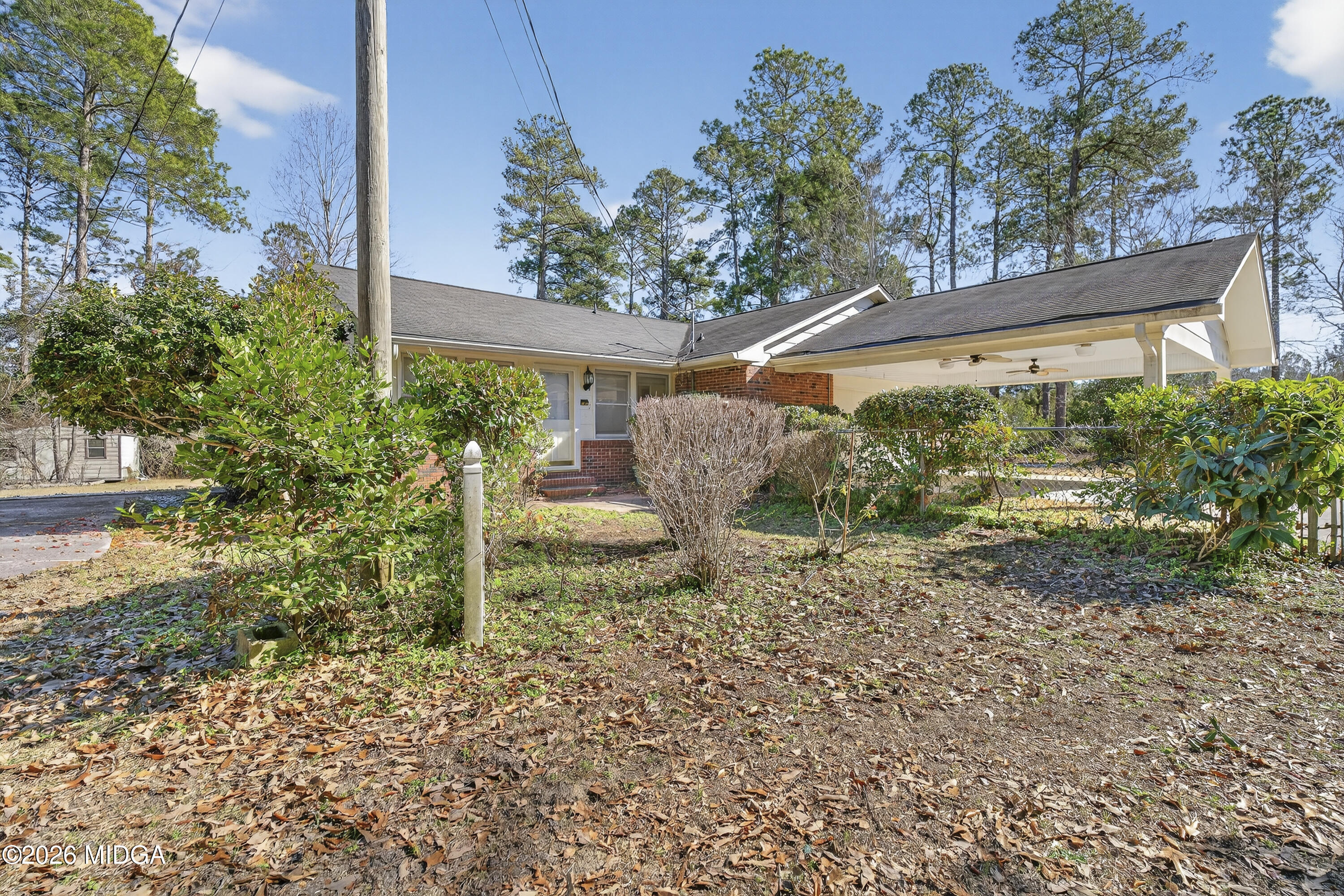 1775 Lower Hartley Bridge Road Byron, GA 31008 - Photo 46 of 51 a view of a house with a yard and plants