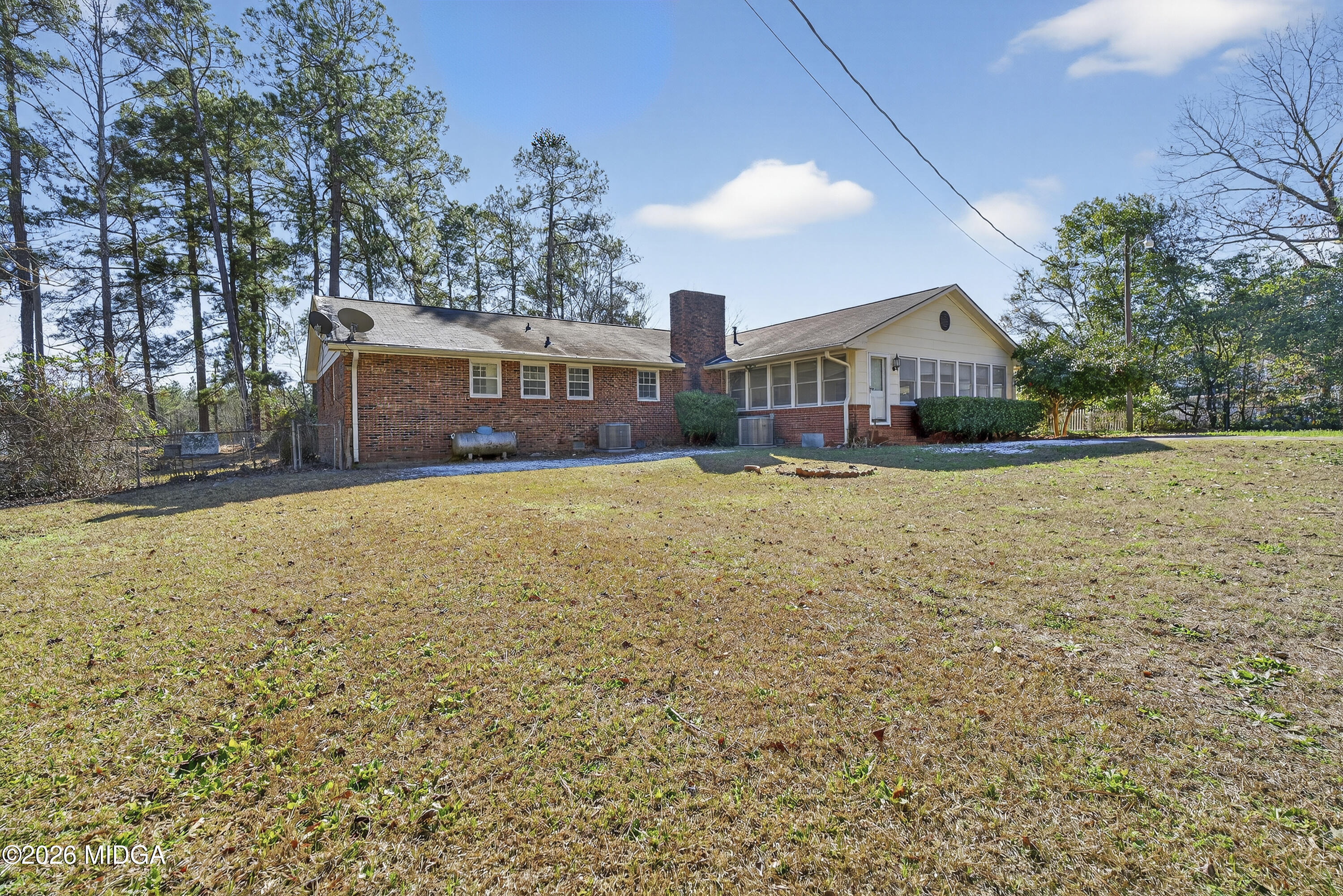 1775 Lower Hartley Bridge Road Byron, GA 31008 - Photo 49 of 51 a view of a house with a yard