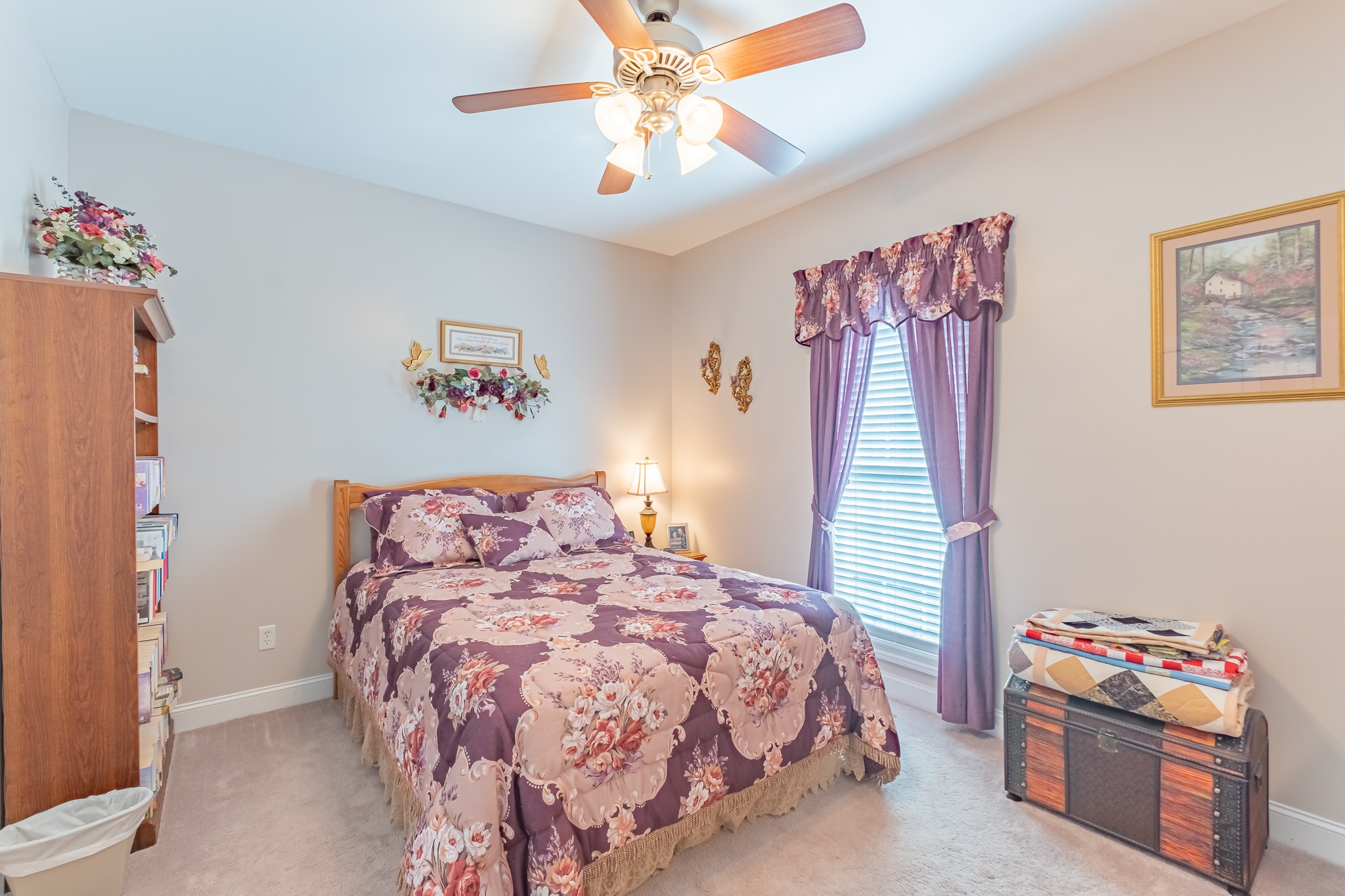 101 Hunters Point Tullahoma, TN 37388 - Photo 54 of 60 a bedroom with a bed and a chandelier