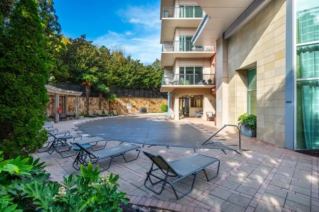 a view of outdoor space with seating area and barbeque oven