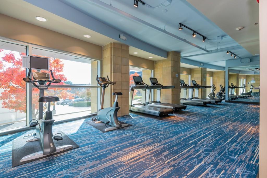 4561 Olde Perimeter Way, Unit 1701 Atlanta, GA 30346 - Photo 42 of 60 a view of a room with gym equipment