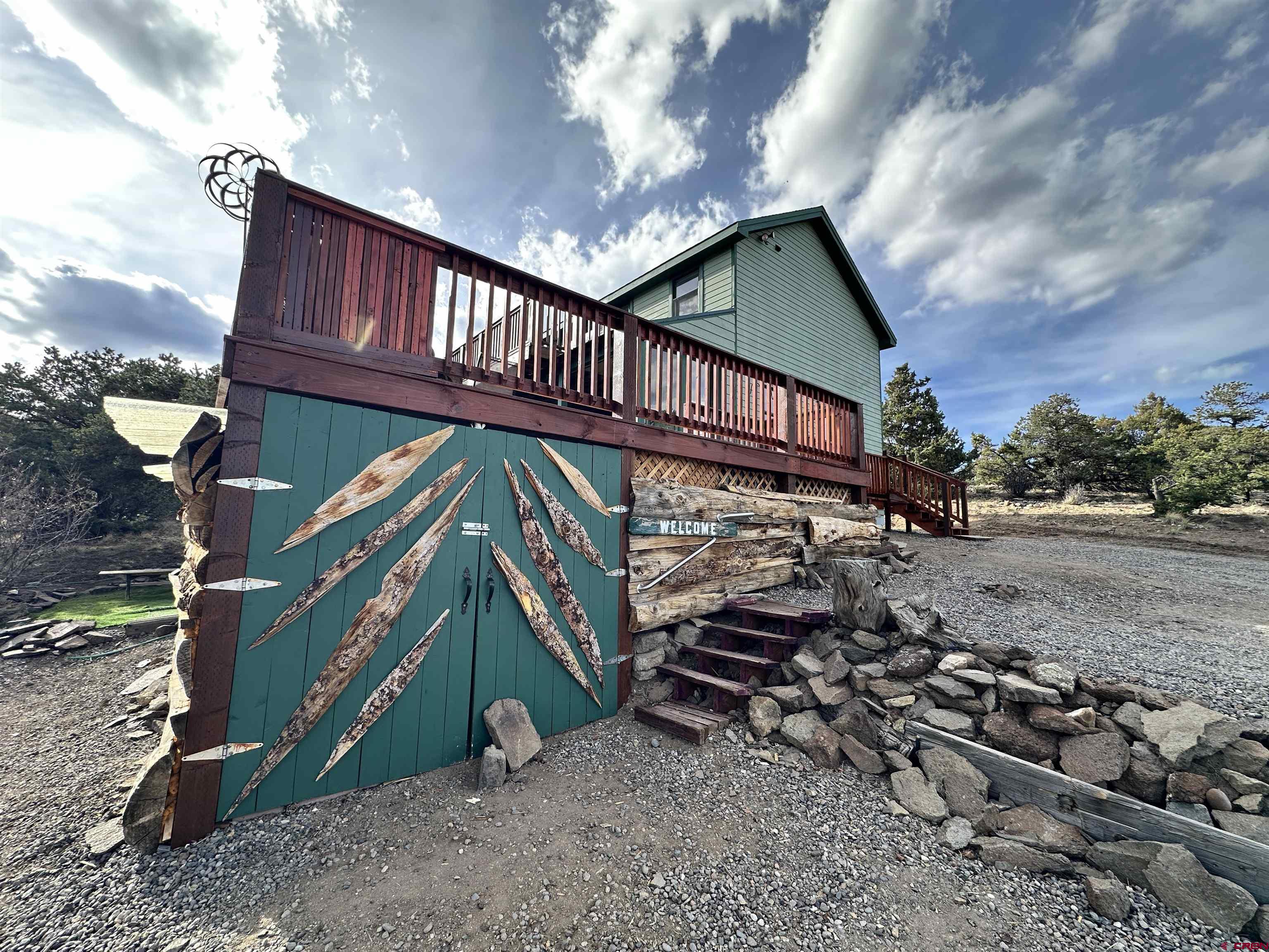 351 Loveland Road South Fork, CO 81154 - Photo 2 of 45 a view of a house with a yard