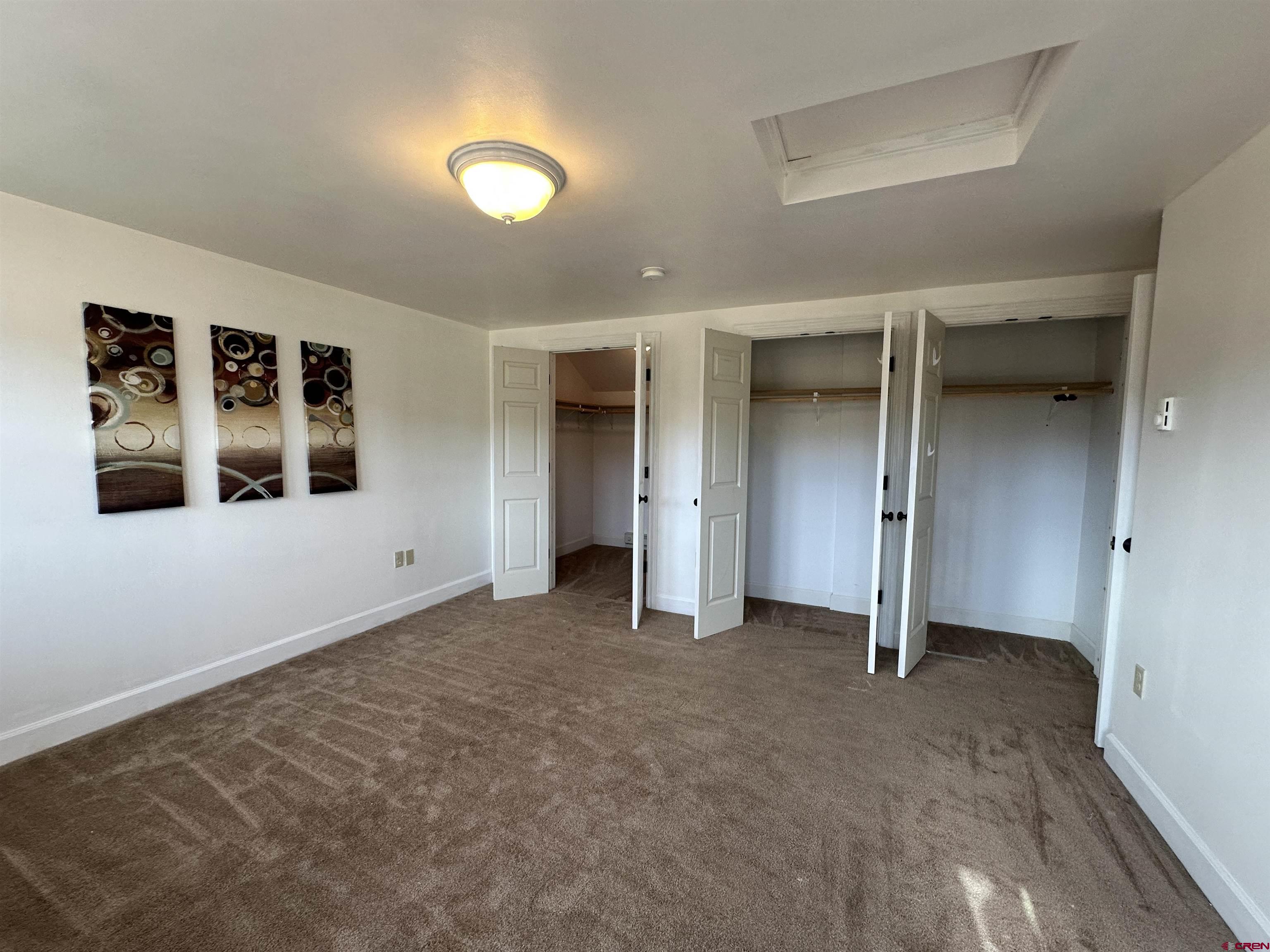 351 Loveland Road South Fork, CO 81154 - Photo 26 of 45 a view of an empty room with window and bathroom