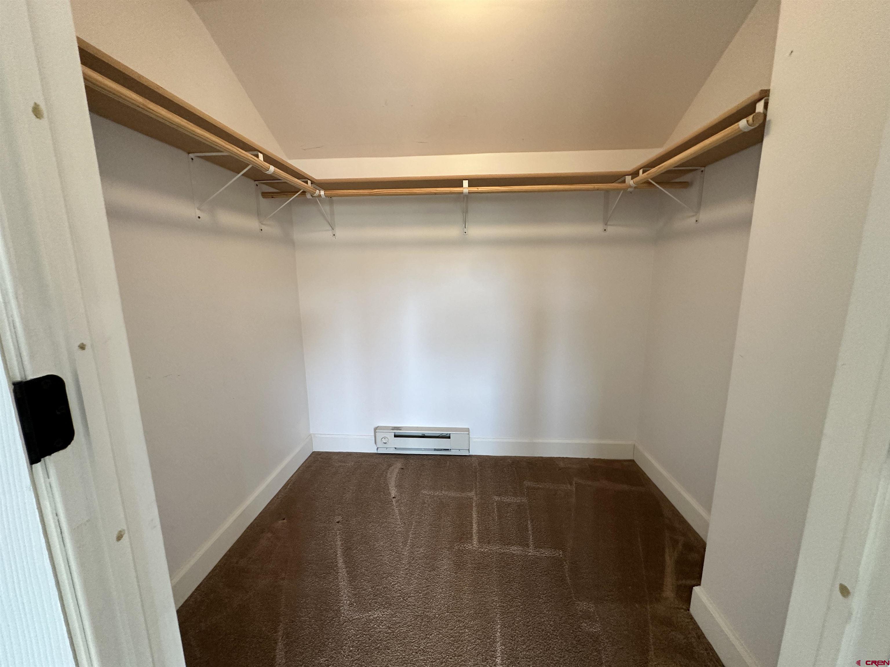 351 Loveland Road South Fork, CO 81154 - Photo 27 of 45 a view of walk in closet with empty racks