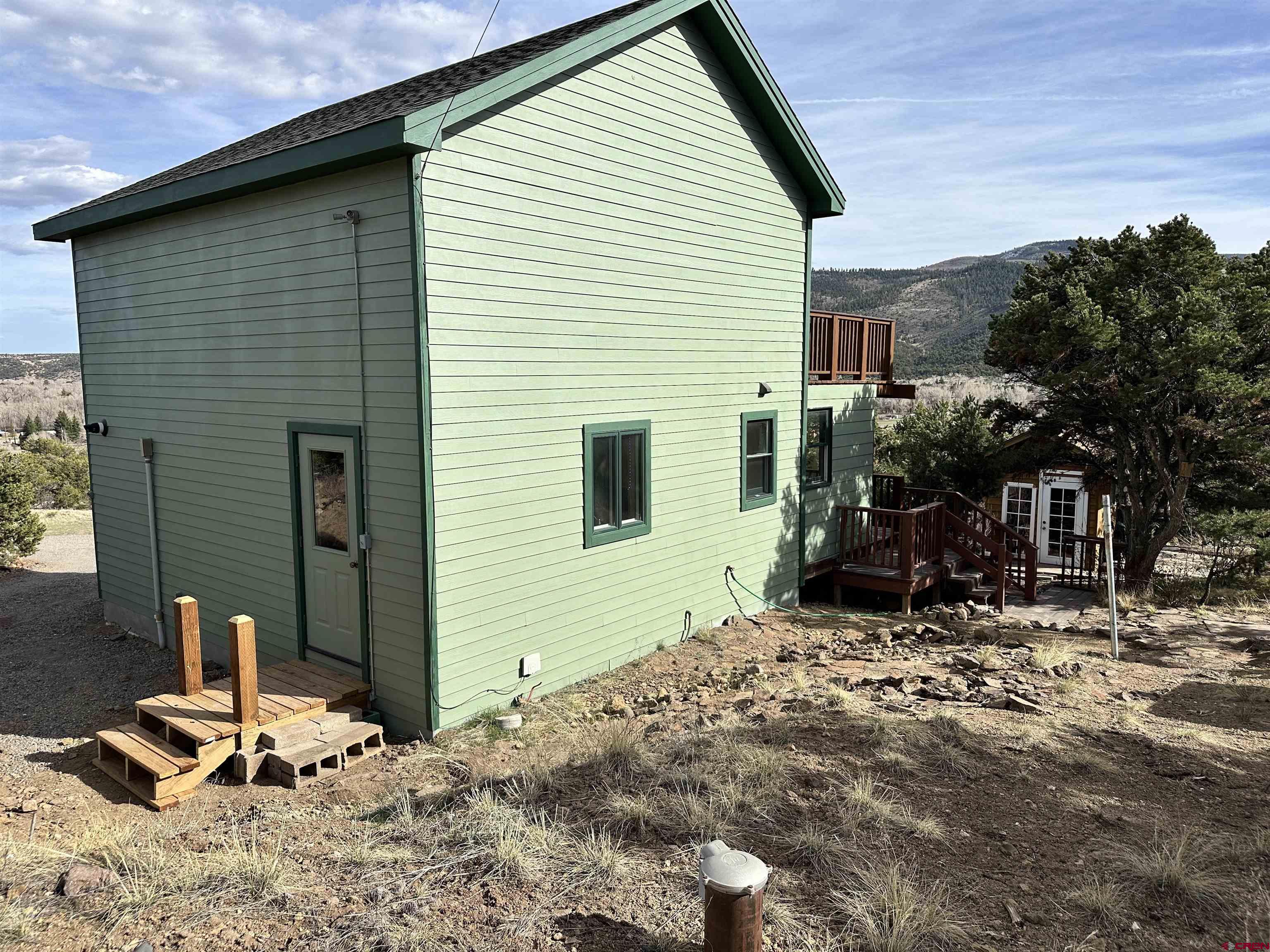 351 Loveland Road South Fork, CO 81154 - Photo 3 of 45 a view of backyard of house