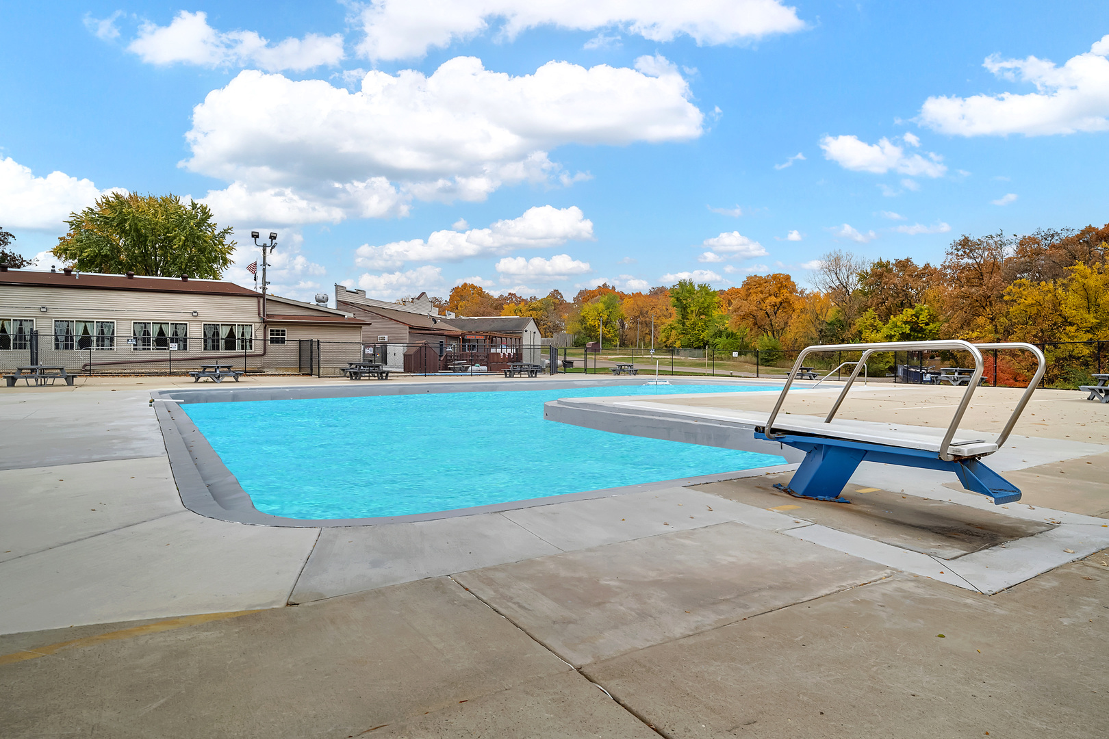 2795 East 28th Road Marseilles, IL 61341 - Photo 46 of 63 a view of a swimming pool with a garden and trees