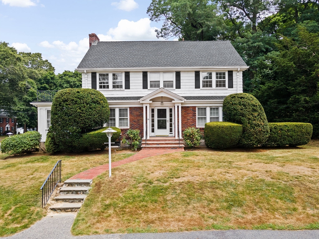 26 Holman Road Newton, MA 02466 - Photo 1 of 42 a view of a house with backyard and plants