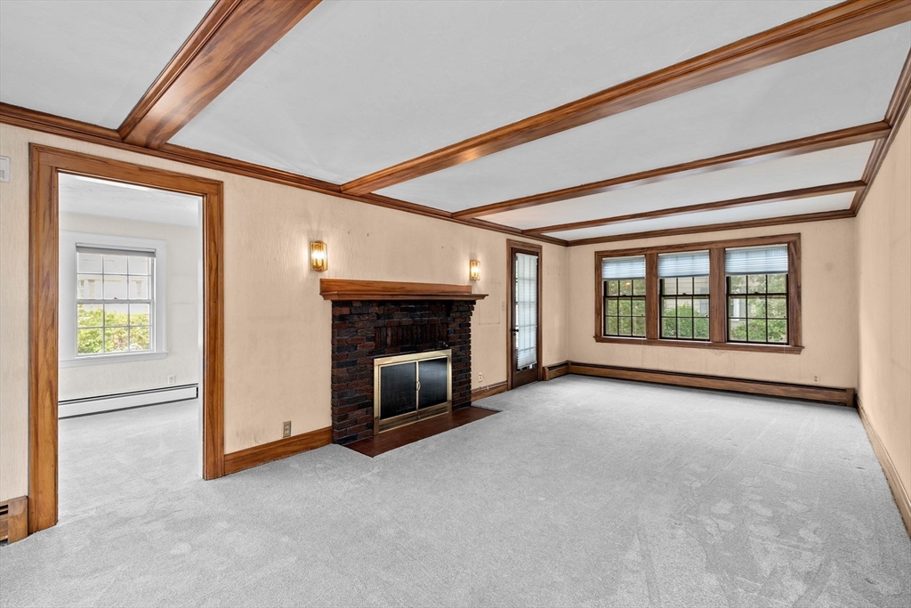 26 Holman Road Newton, MA 02466 - Photo 15 of 42 a view of empty room with a fireplace