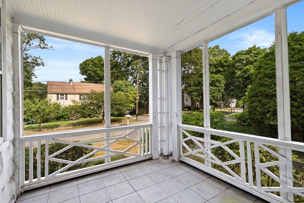 26 Holman Road Newton, MA 02466 - Photo 22 of 42 a view of a two chairs in the balcony