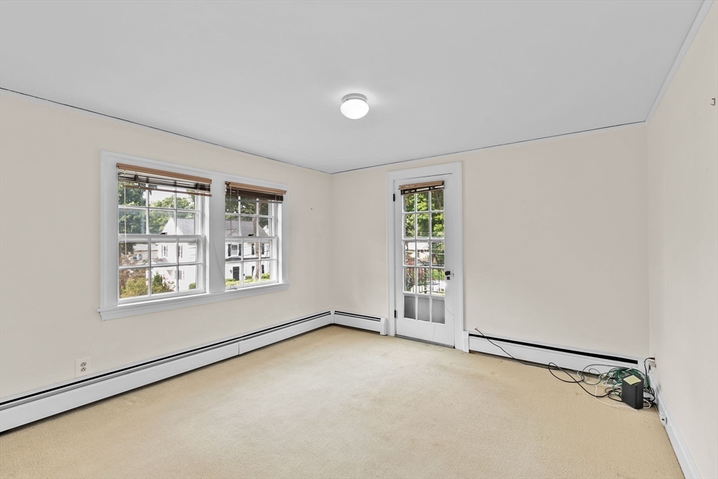 26 Holman Road Newton, MA 02466 - Photo 33 of 42 an empty room with windows