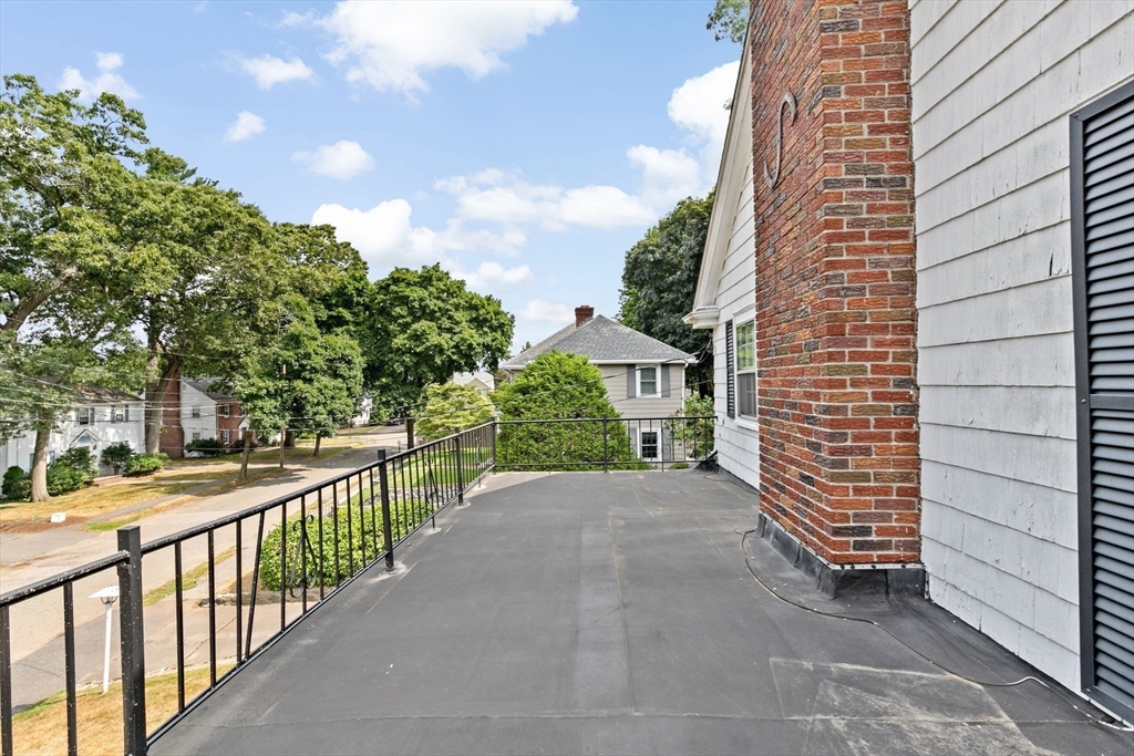 26 Holman Road Newton, MA 02466 - Photo 39 of 42 a view of a house with a yard