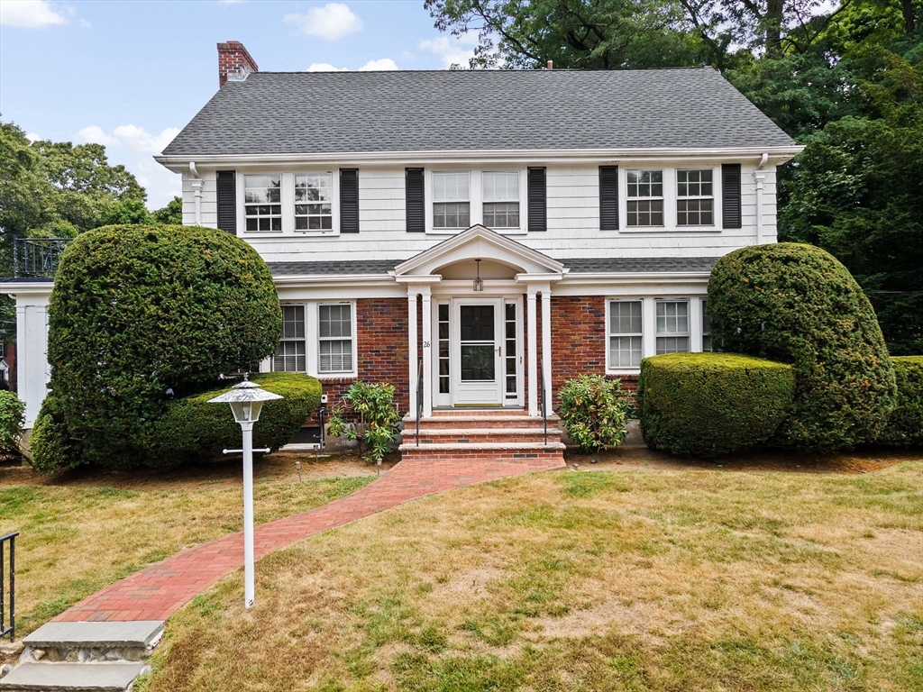26 Holman Road Newton, MA 02466 - Photo 42 of 42 a front view of a house with a yard