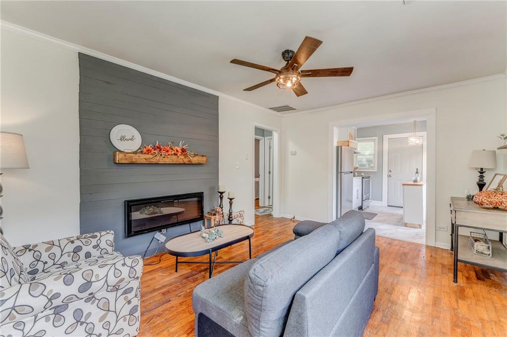 2005 Highland Circle Rome, GA 30161 - Photo 12 of 36 a living room with furniture and a fireplace