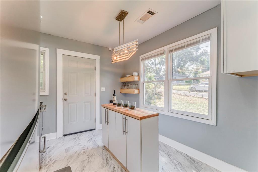 2005 Highland Circle Rome, GA 30161 - Photo 19 of 36 a kitchen that has a stove a refrigerator and a sink