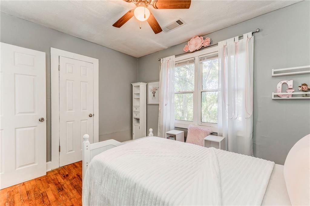 2005 Highland Circle Rome, GA 30161 - Photo 25 of 36 a bedroom with a large bed and a window